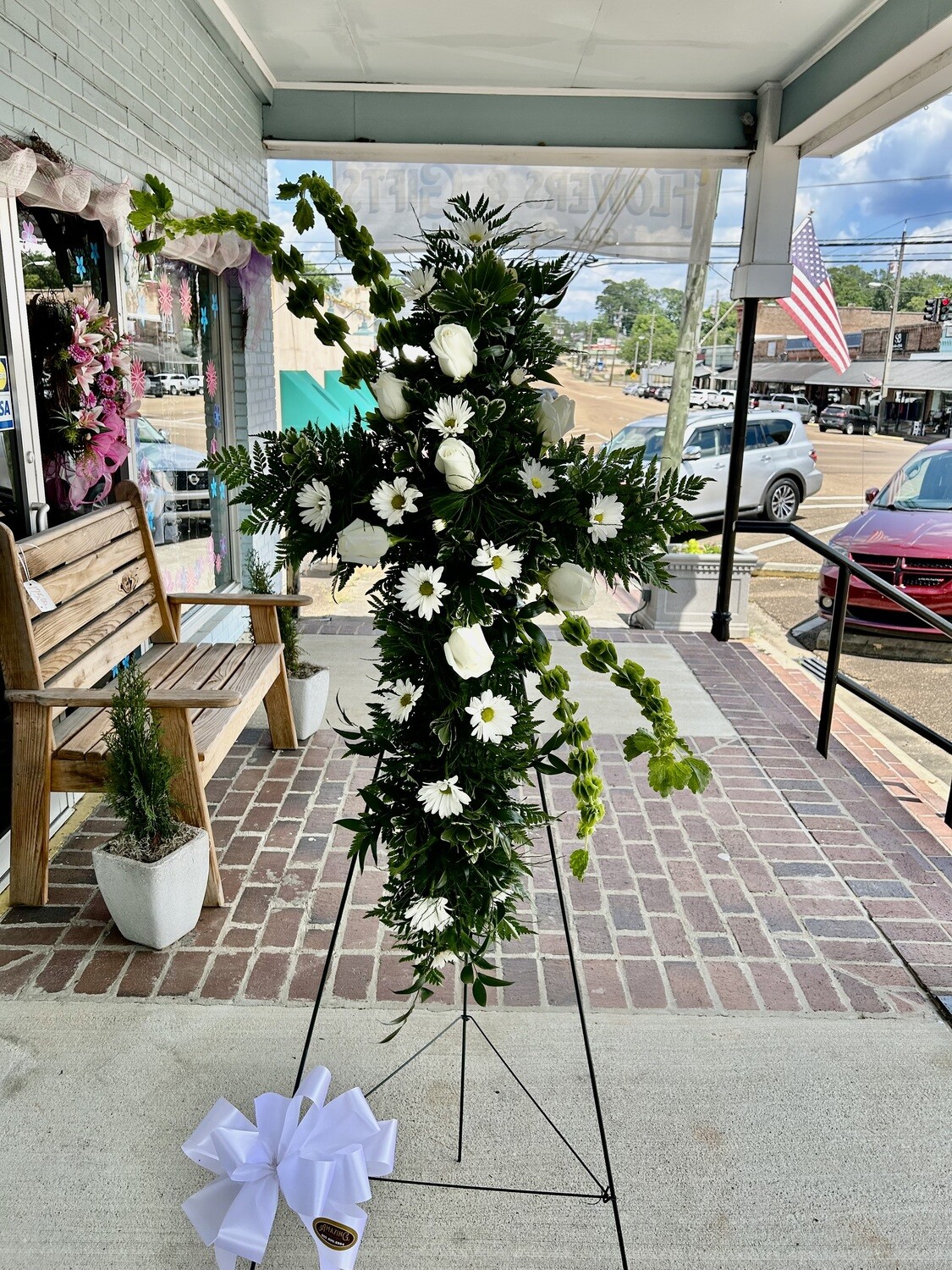 Cross of fresh flowers