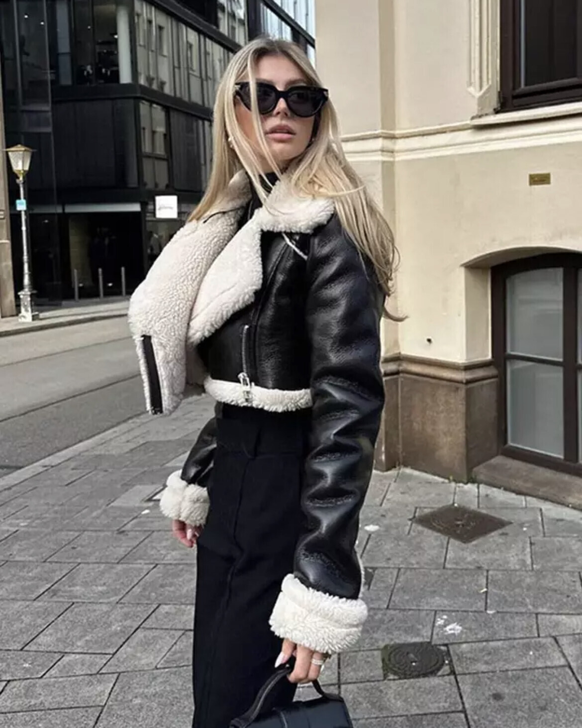 Short black jacket with white wool