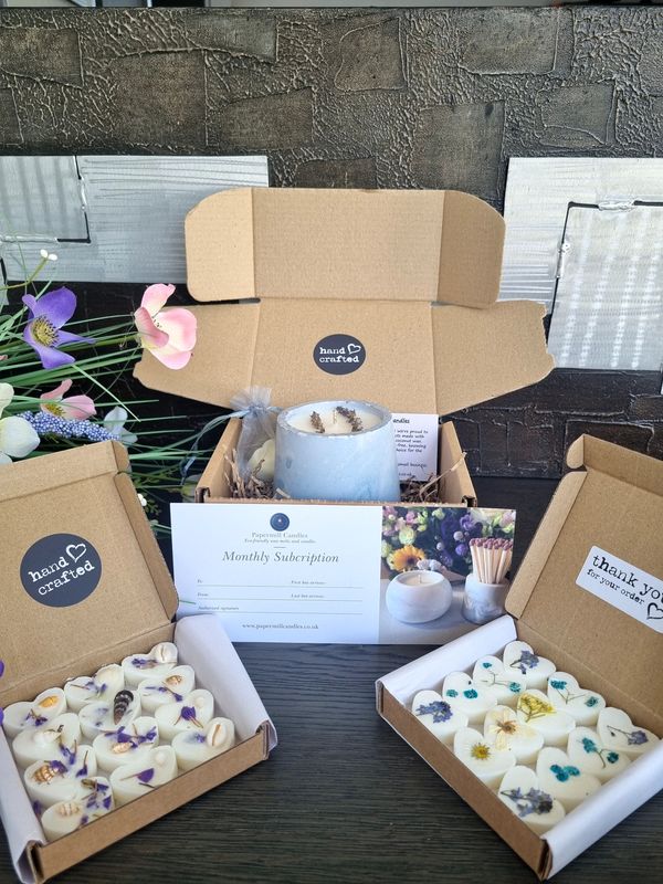 One Candle + Two Boxes of Wax Melts