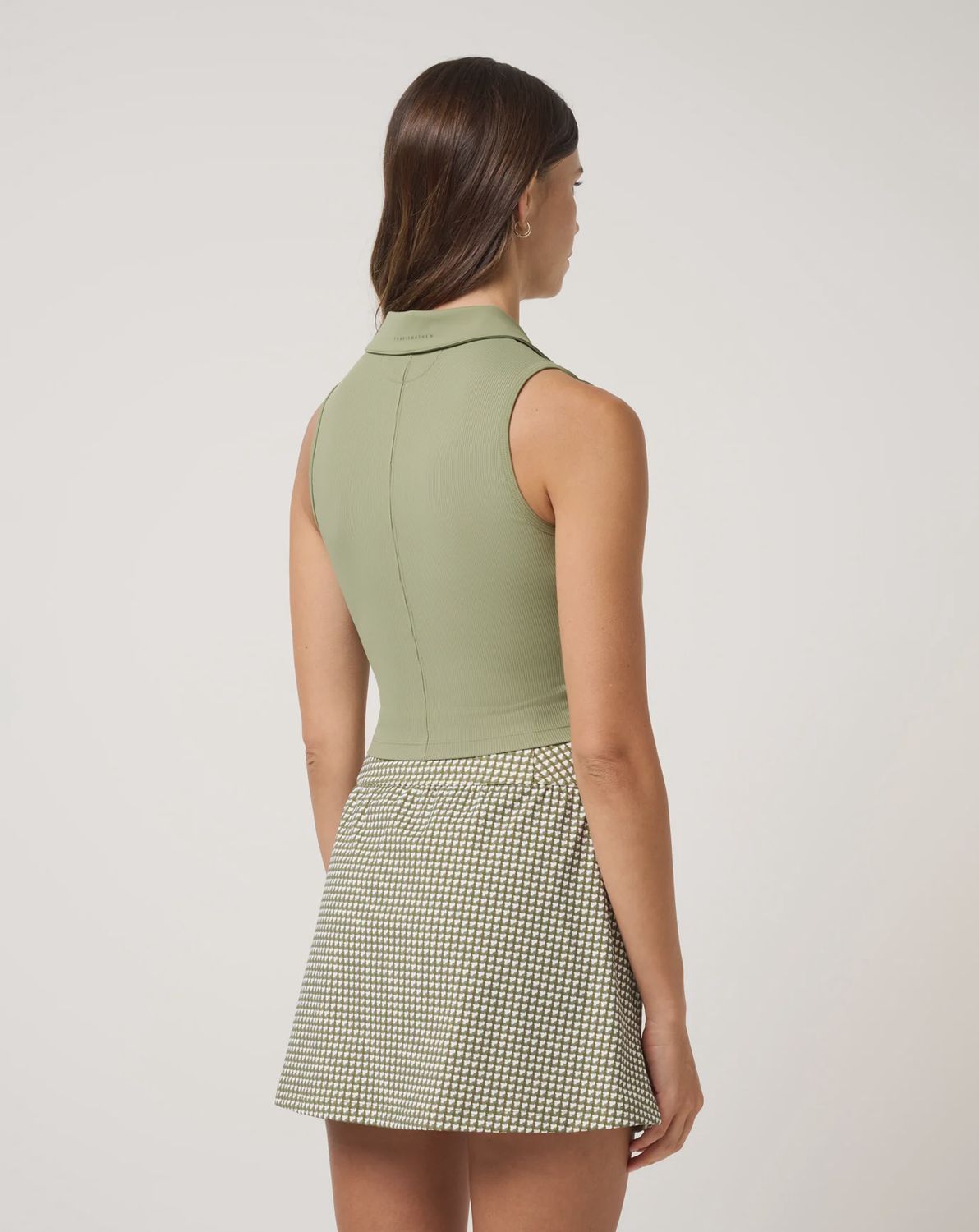 Travis Mathew Womens Moveknit Rib Knit SL Zip Polo