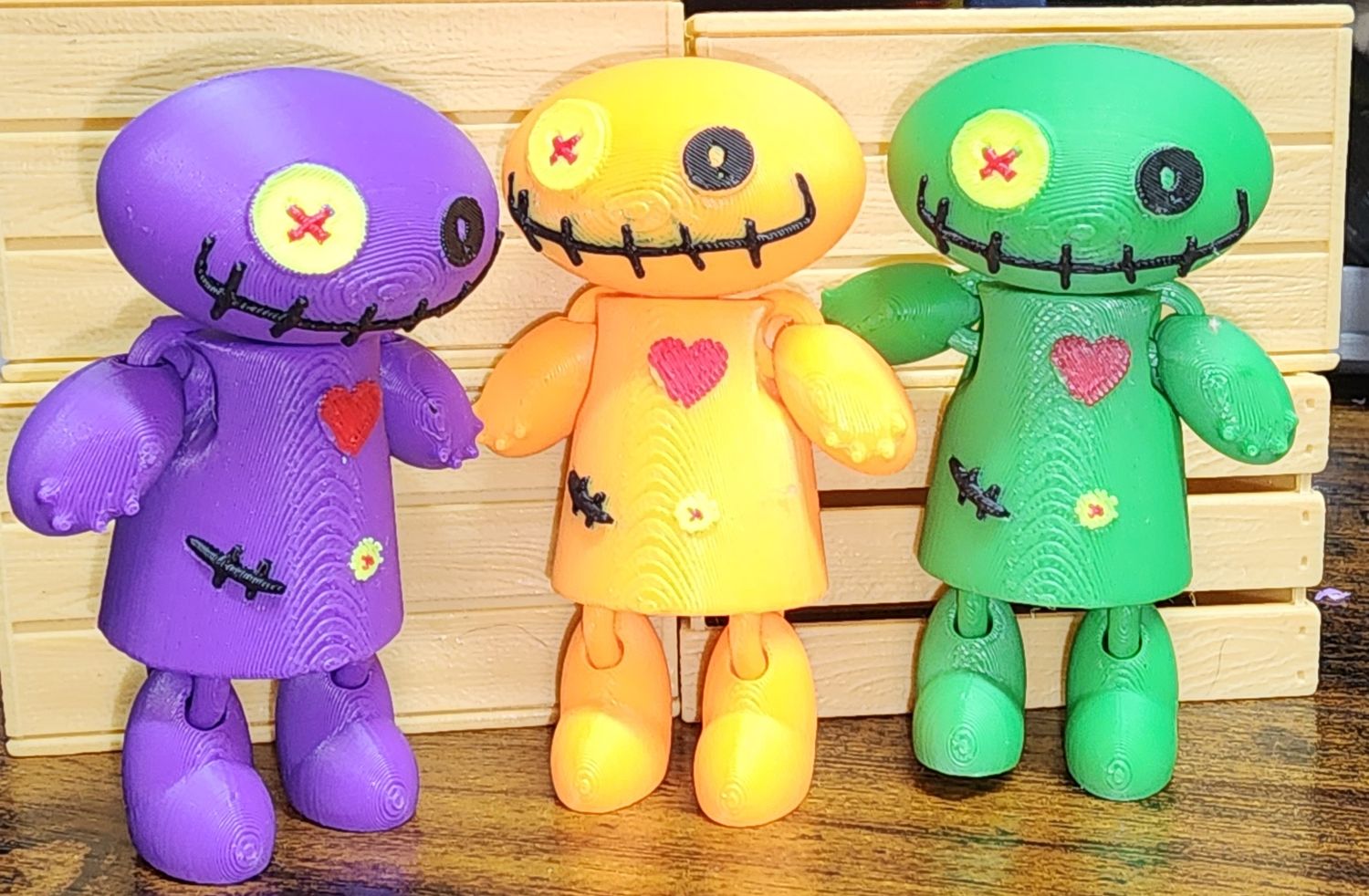 3 colorful voodoo dolls