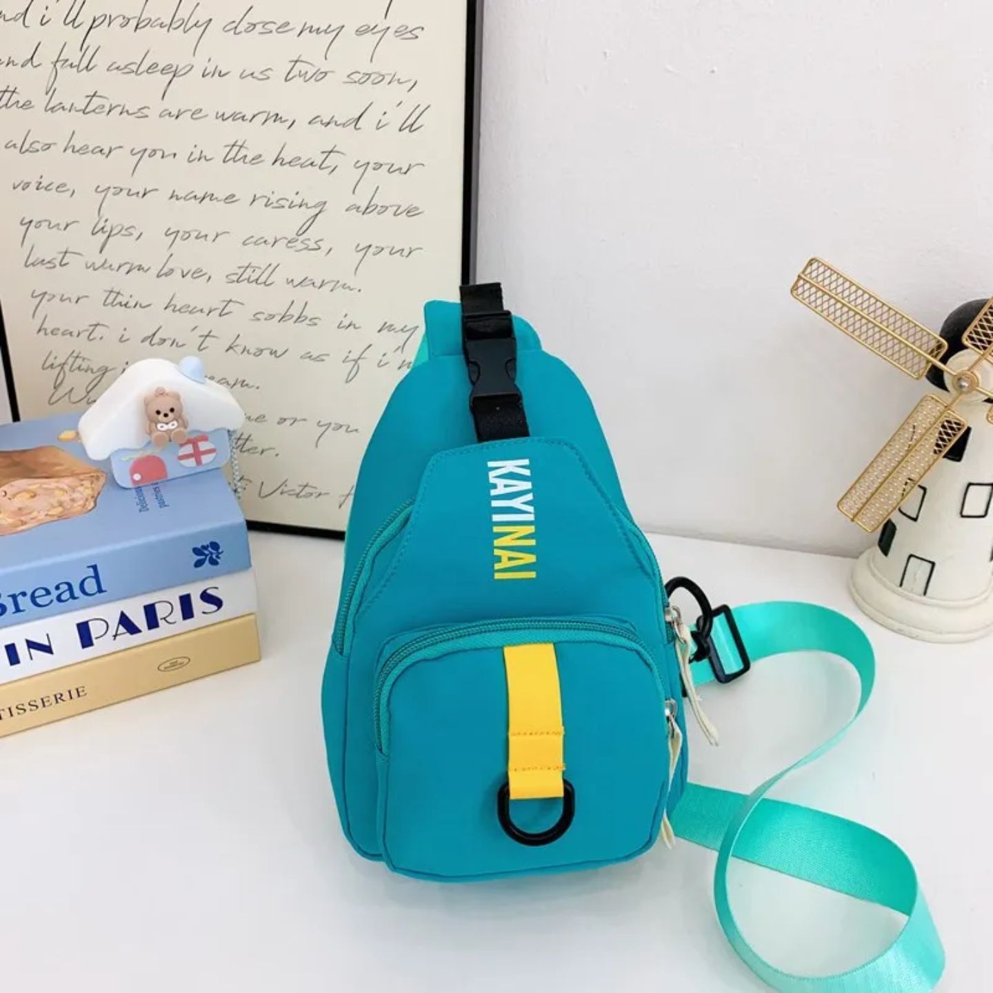 حقيبة تركوازي خط اصفر