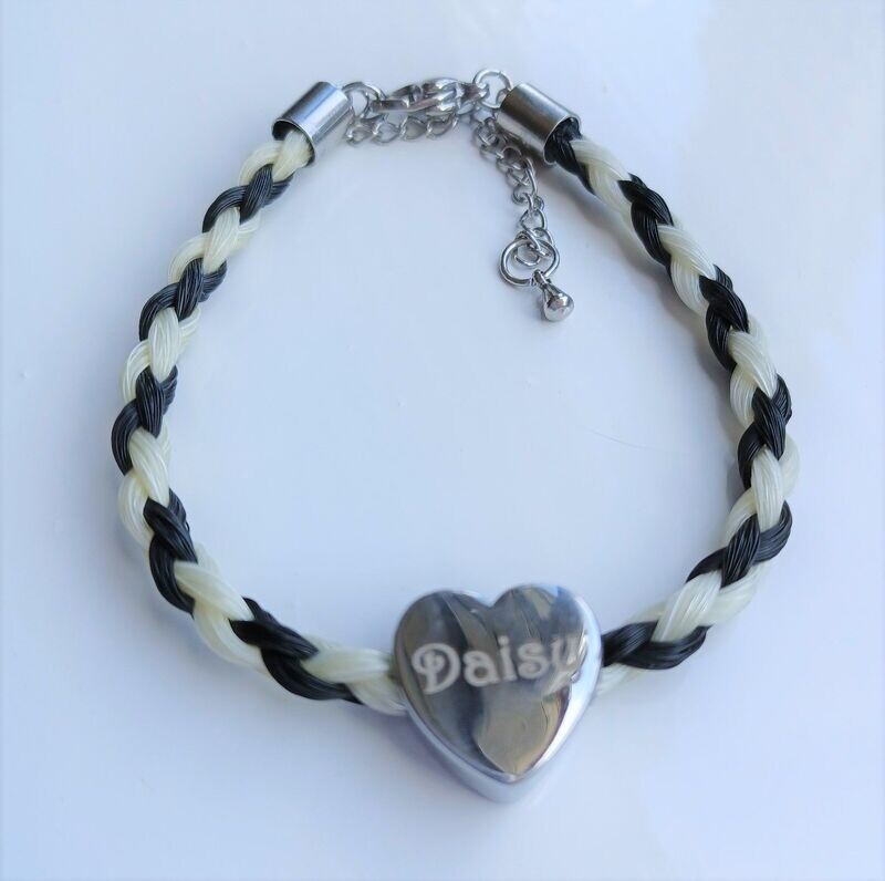Horsehair keepsake bracelet made using your own horses hair with a personalised heart charm bead. Stainless steel Silver coloured findings. Memory jewellery