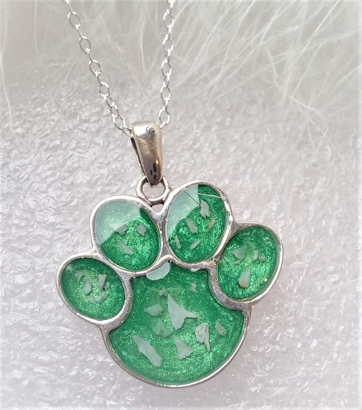 Sterling Silver paw pendant and chain to contain a stone encapsulating the hair, fur or ashes you send me.  Memorial Jewellery Keepsake Jewellery. Can be personalised on the back