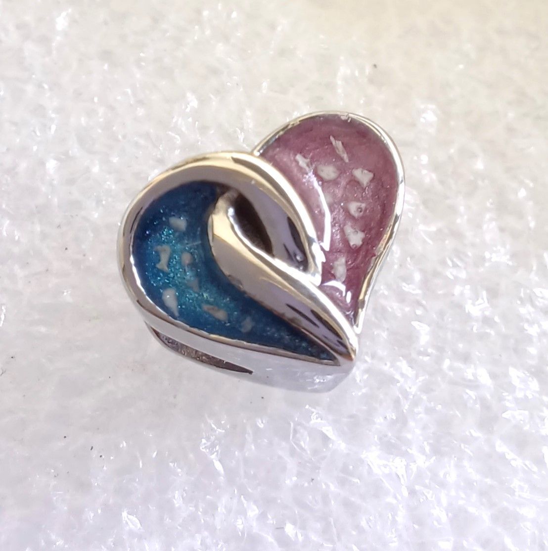 Stainless steel entwined heart charm bead. Each side can contain fur, hair or ashes you provide. Keepsake Jewellery. Memorial Jewellery. Memory Jewellery