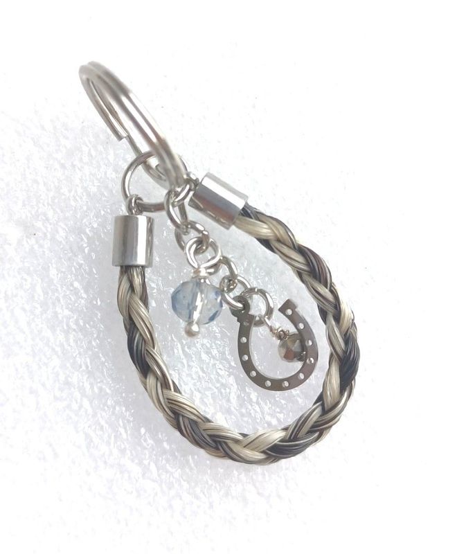Braided Horsehair key charm using the horse hair you send me.  Can include a horseshoe charm and an engraved heart charm. Keepsakes horsehair jewellery