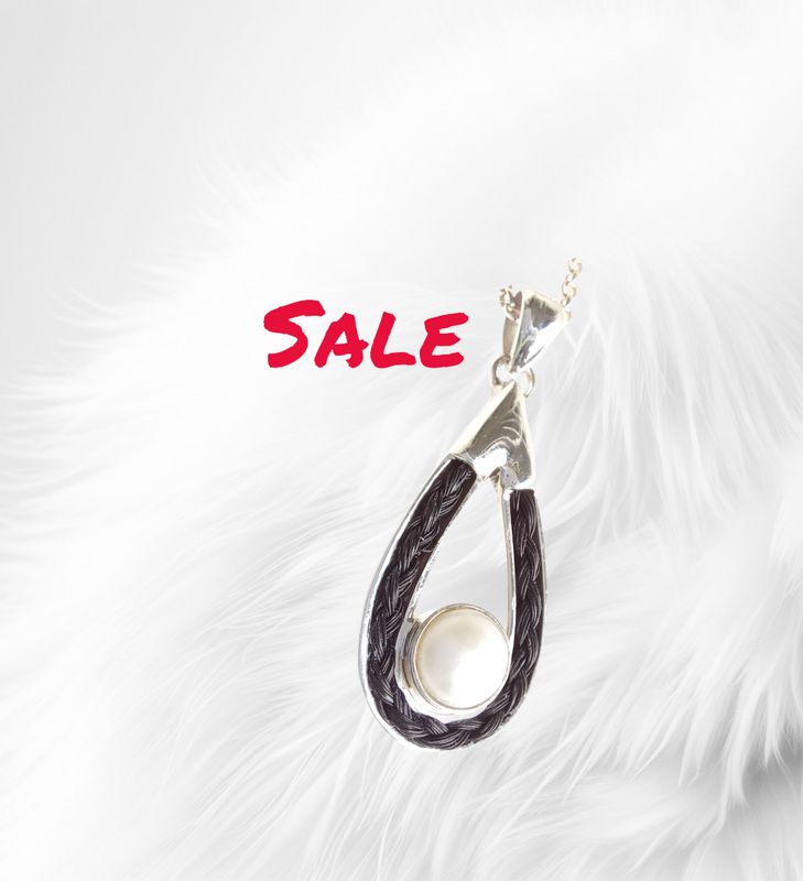 Sterling silver tear pendant with real pearl and a braid of your own horses hair.  Horsehair keepsake jewellery