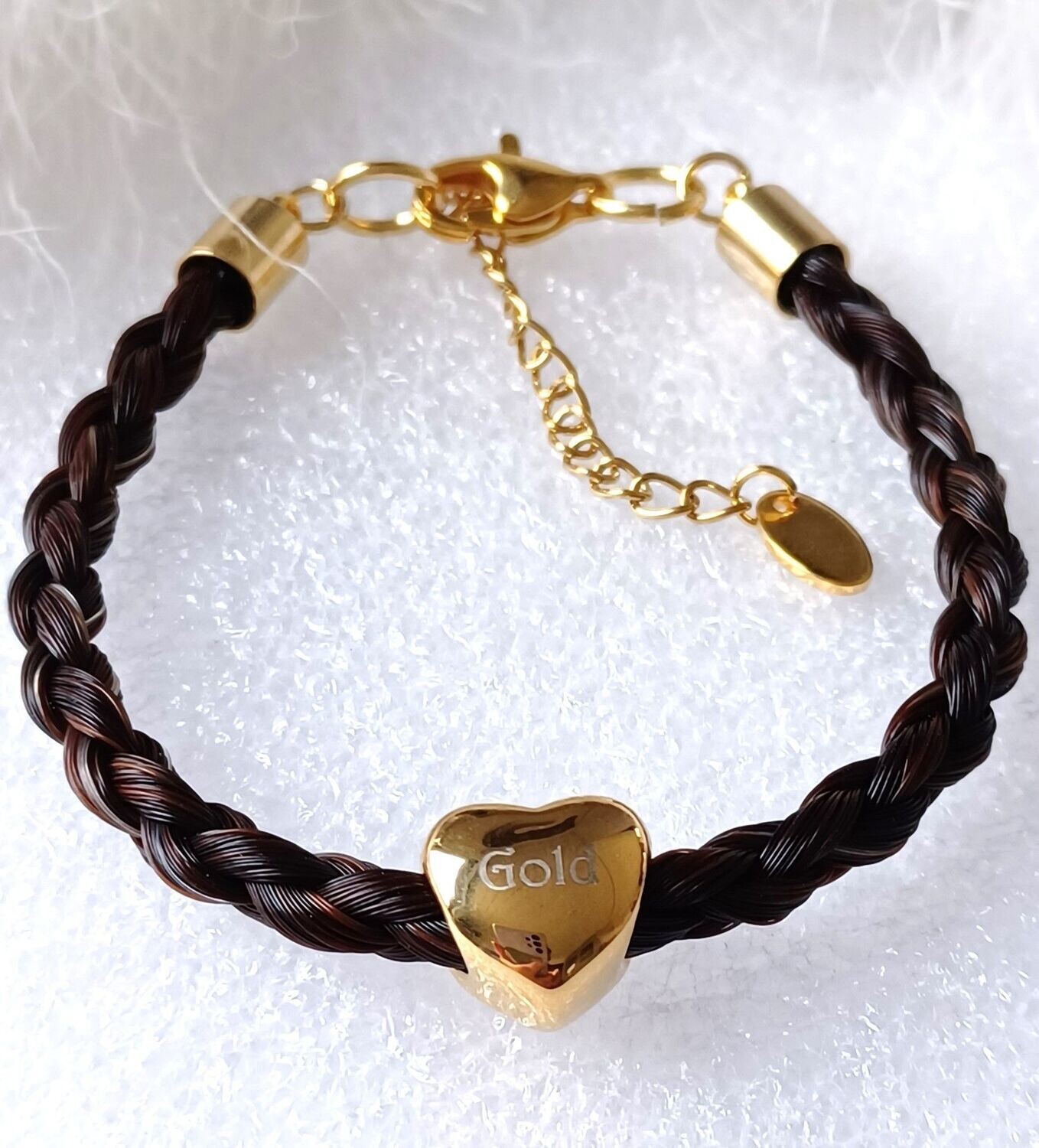 ENGRAVED HORSE HAIR Braided bracelet 4 strands GOLD stainless steel heart Horsehair keepsake bracelet made using your own horses hair with a personalised heart charm bead. Stainless steel Gold coloured findings. Memory jewellery