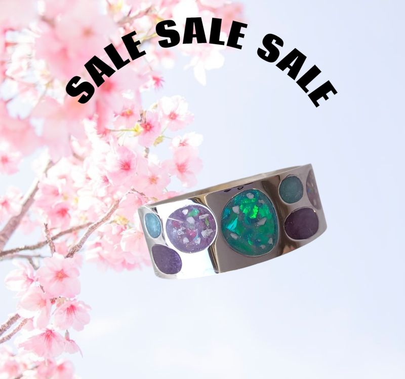 Titanium Bubble Ring 8mm thick to contain ashes you supply with a background colour of choice