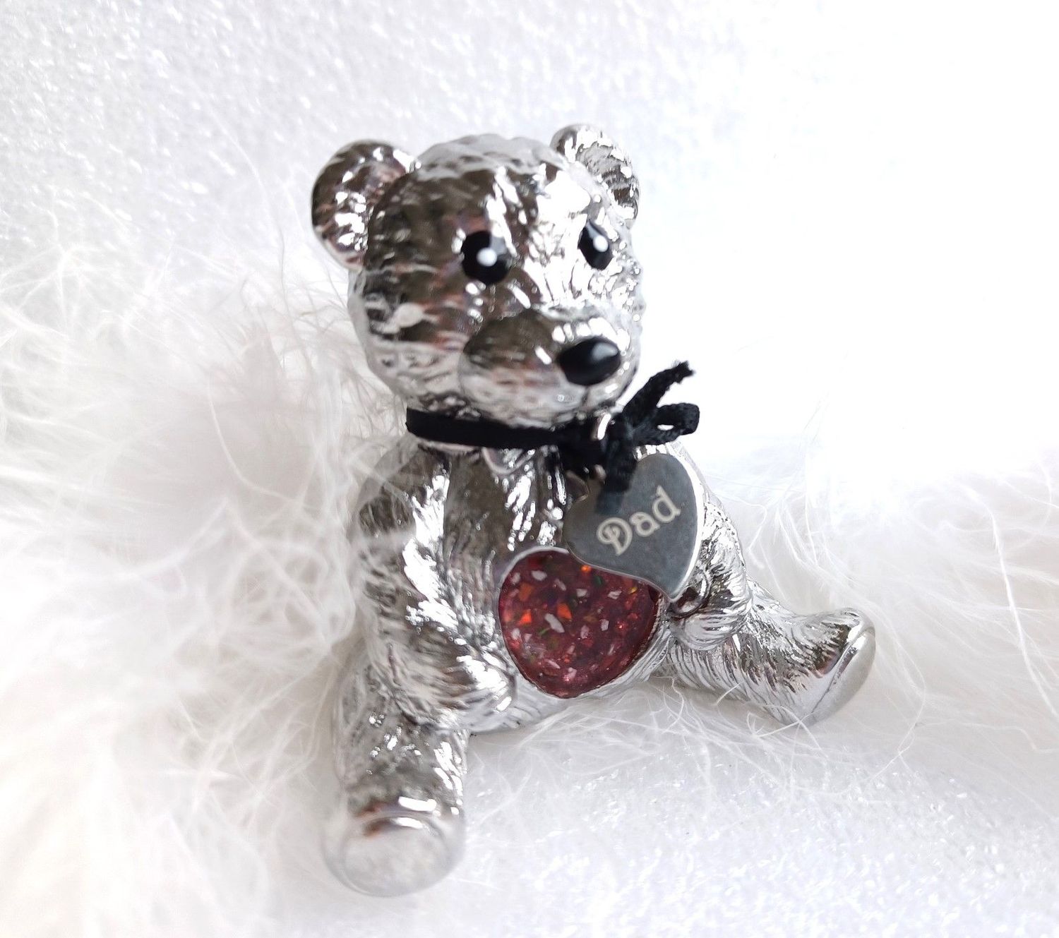 Bear paper weight with heart inlay to contain hair, fur or ashes