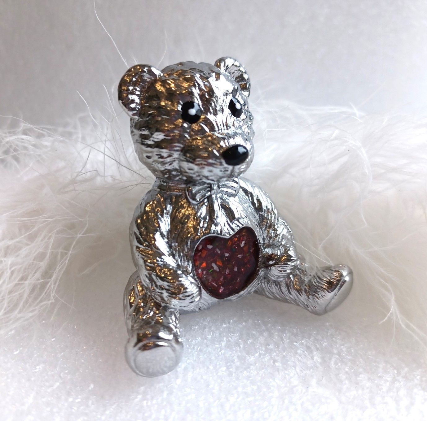 Bear paper weight with heart inlay to contain hair, fur or ashes