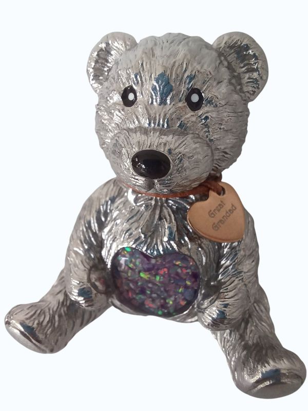 Bear paper weight with heart inlay to contain hair, fur or ashes