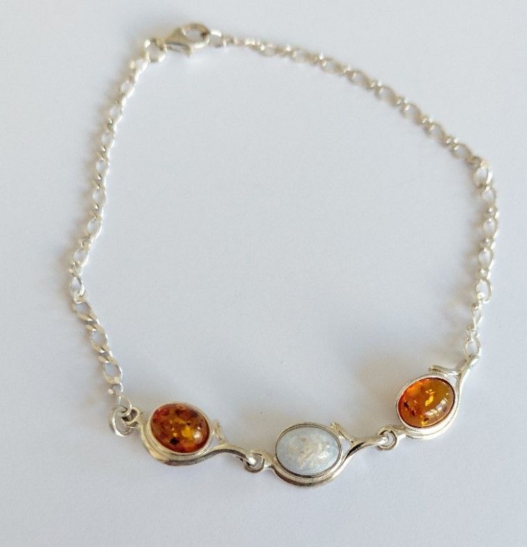 Bangle with  three 8x6mm cabochon Sterling Silver, you choose between semi precious or a stone with inclusions you supply