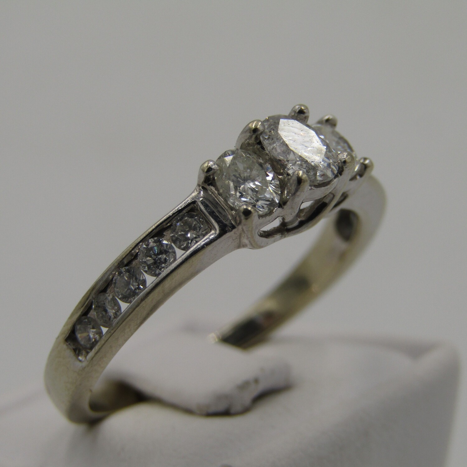 14kt White Gold ring with 13 diamonds totalling 1,5 carat Diamonds SI / G - Size T Originally bought on board the Ocean Village 2 for R50 000 in 2008