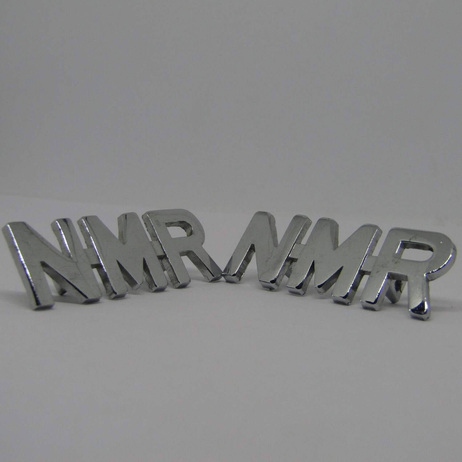 Pair of Natal Mounted Rifles shoulder titles