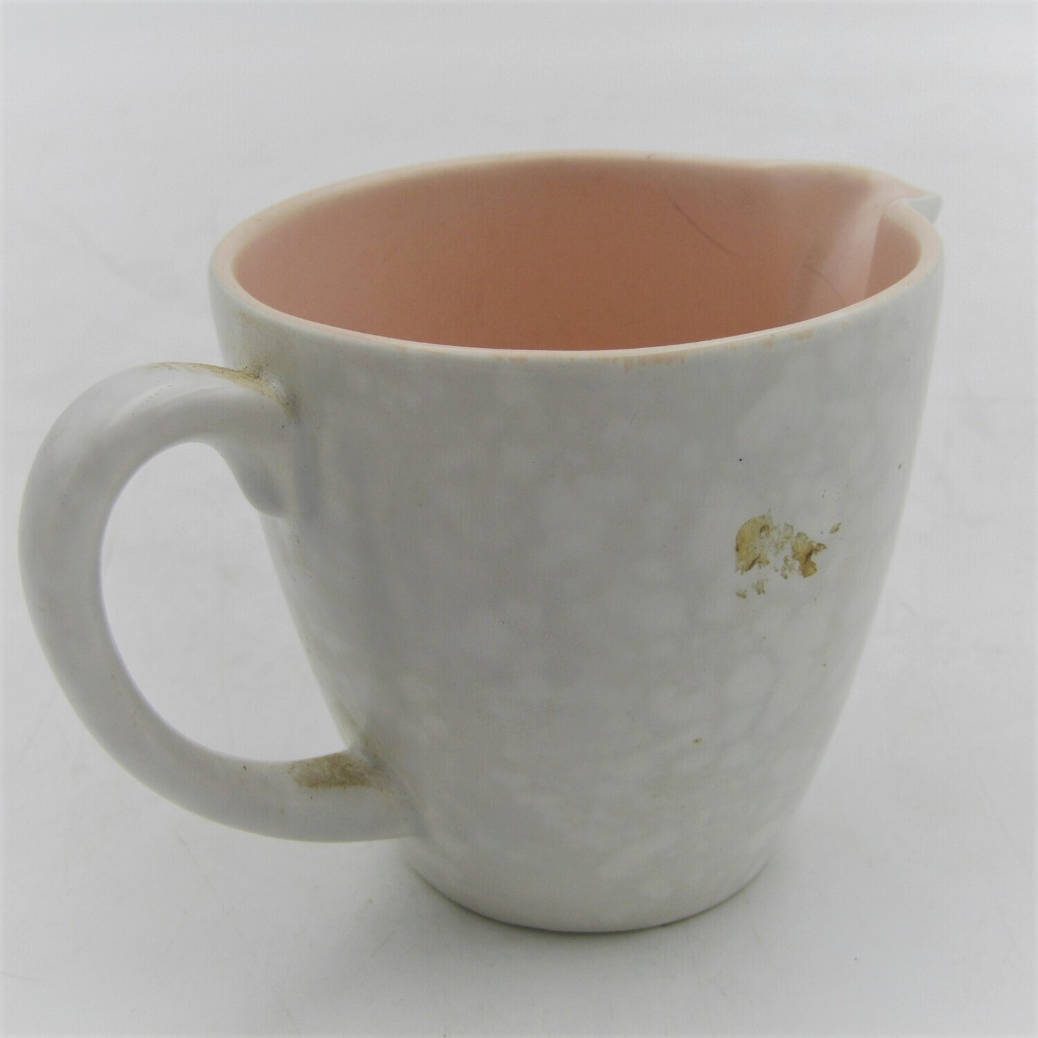 Vintage Poole milk / cream jug with pink inside