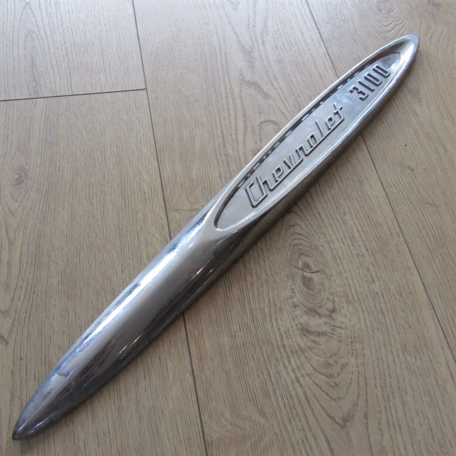 1957 Chevrolet 3100 pickup truck fender badge