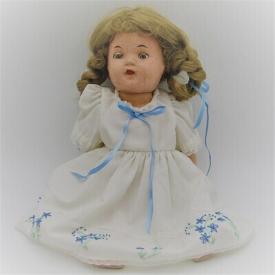 Antique Composition doll with clothing