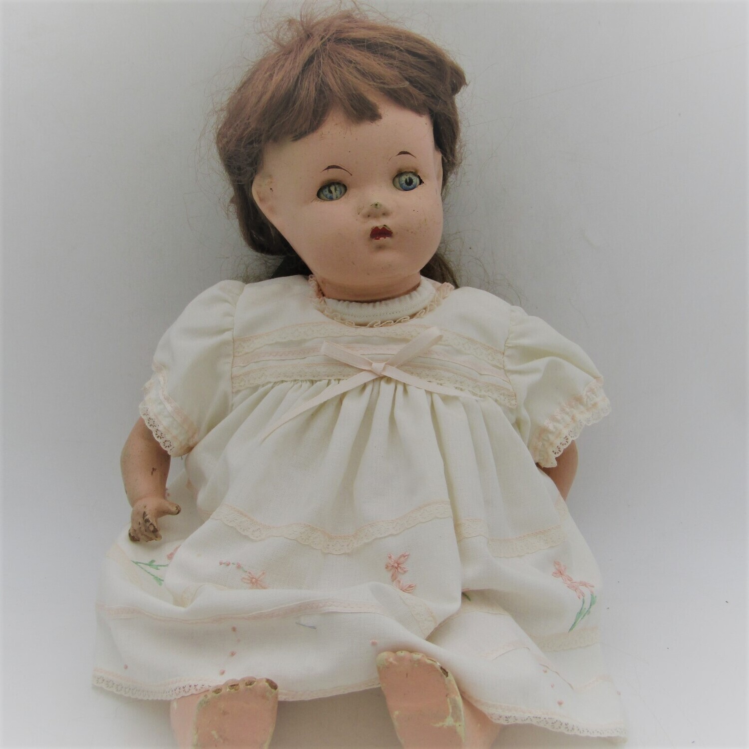 Antique Composition doll with clothing