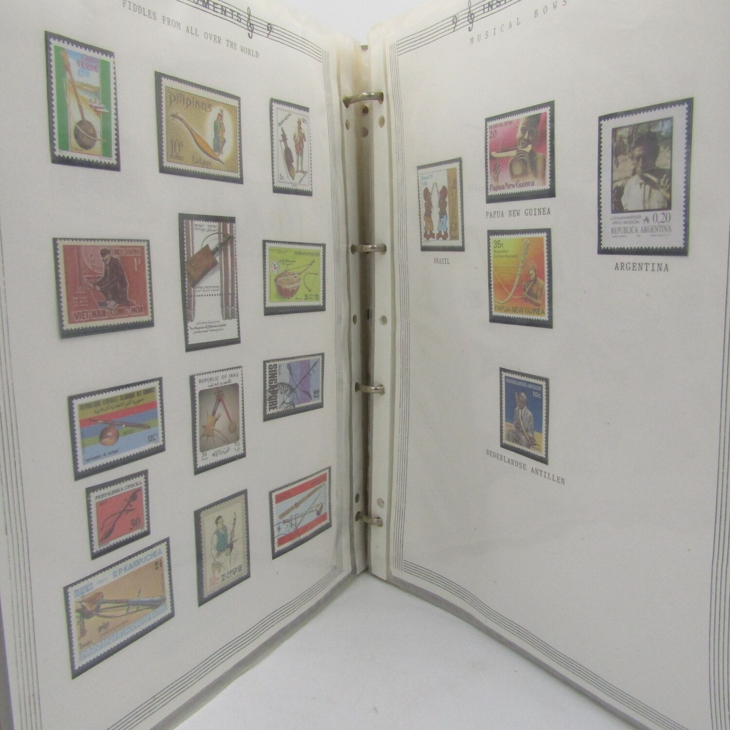 Album with Thematic collection Musical Instrument stamps 491 stamps in total