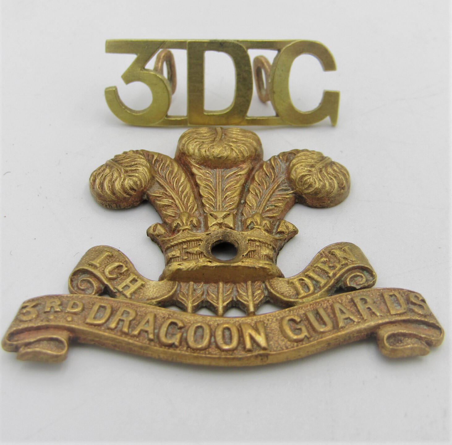 Royal 3rd Dragon Guards cap badge with shoulder title