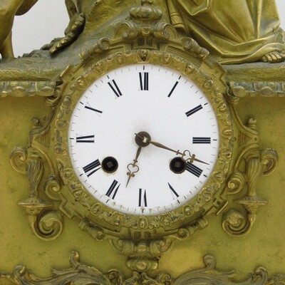 Antique French brass clock with mother and boys under tree