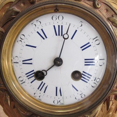 Antique French Ormolu urn clock with stone base
