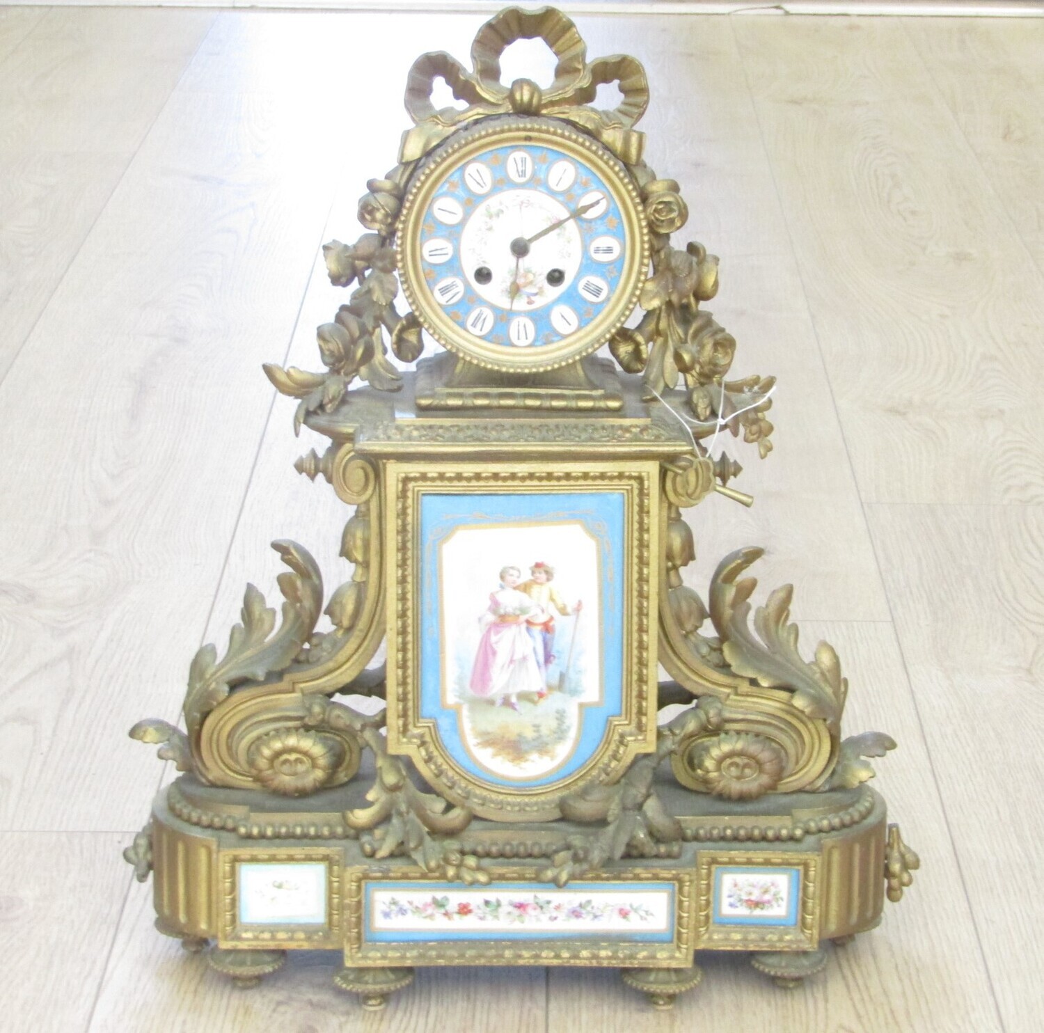 Antique French Louis XV Style Ormolu and porcelain mantel clock