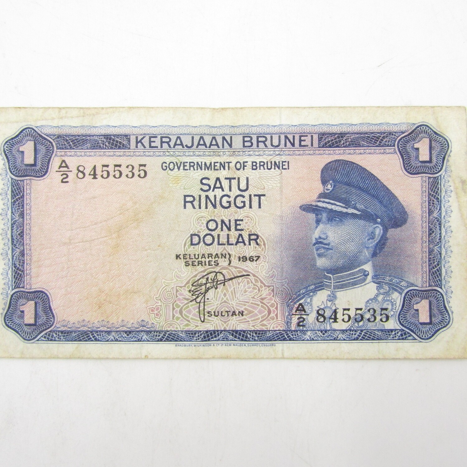 Brunei 1967 One dollar banknote well used