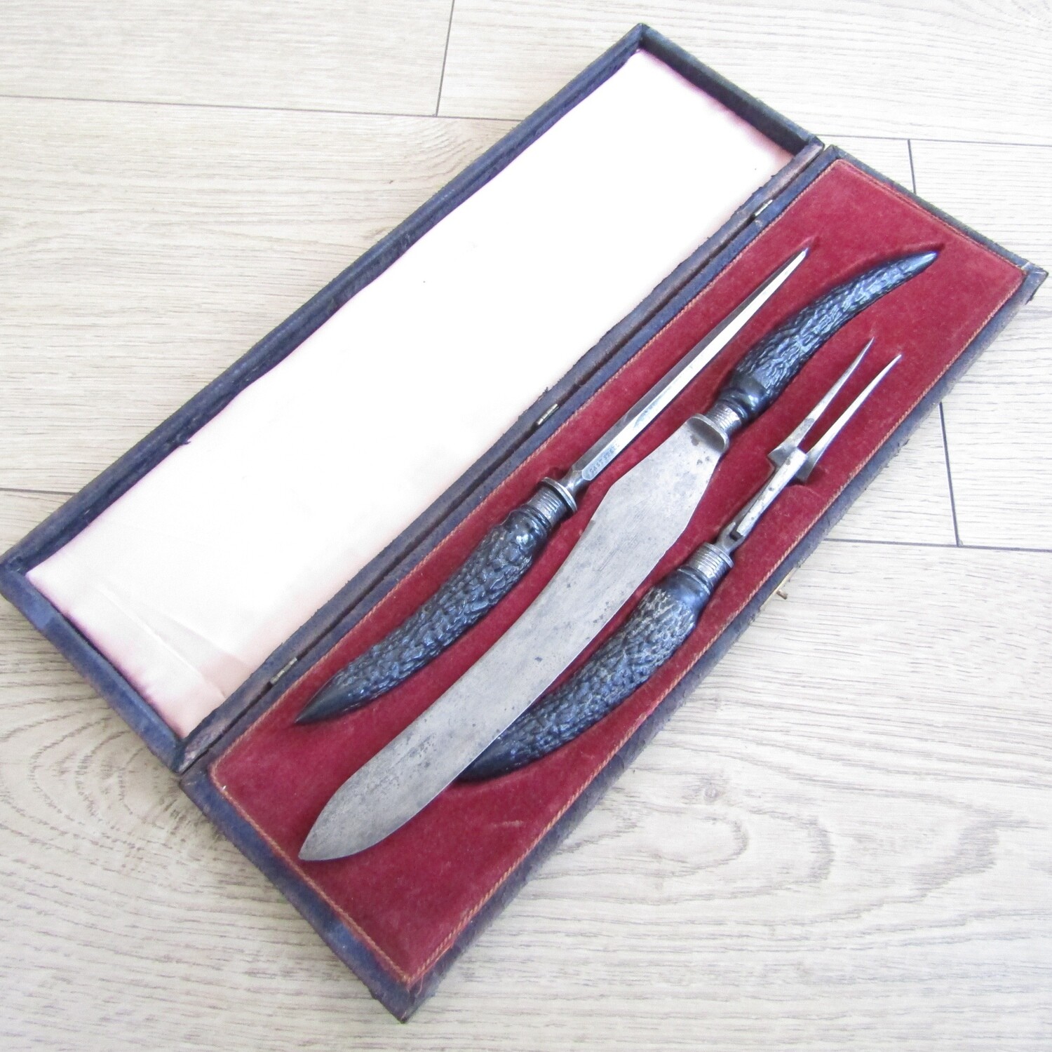 Antique Joseph Rodgers and Sons carving set in leather clad case