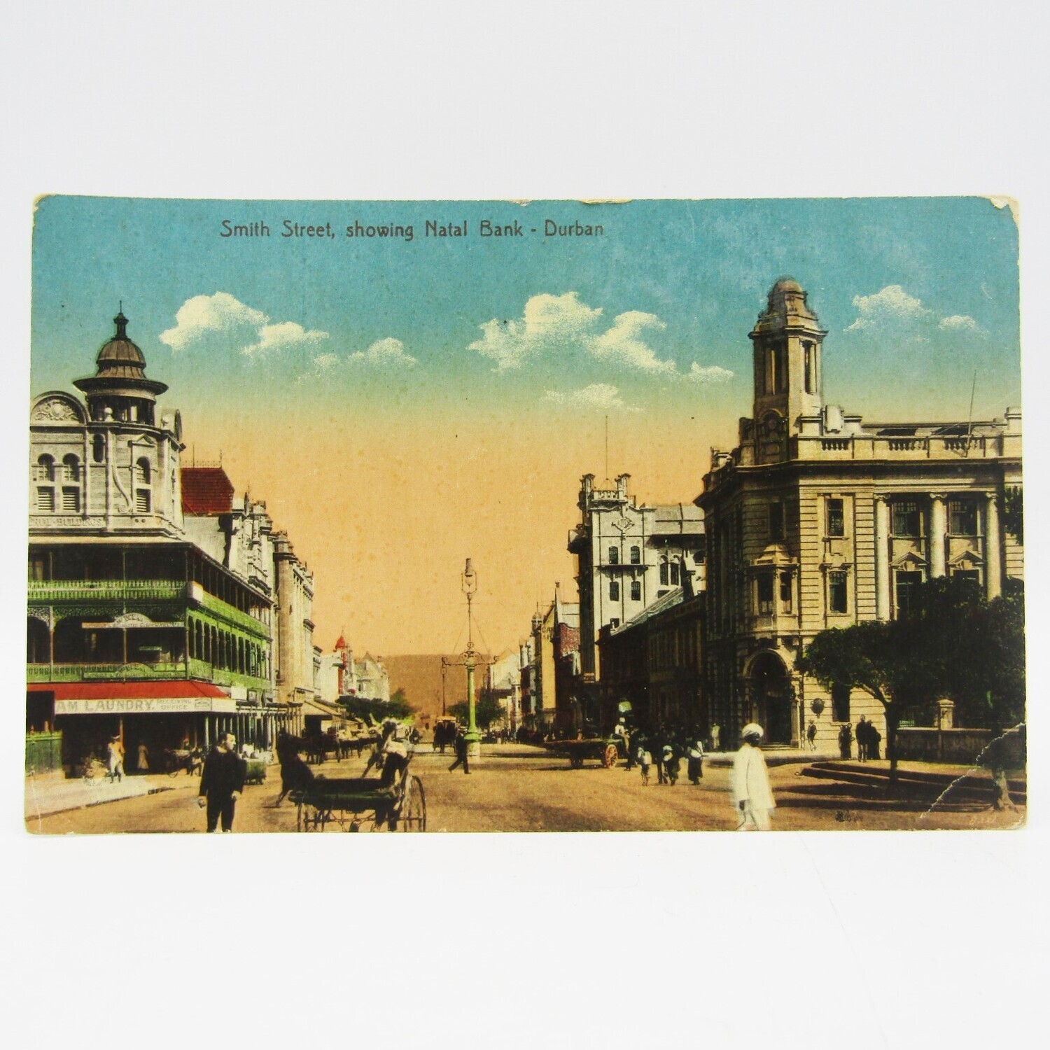 Antique color postcard of Smith Street Durban showing the Natal Bank