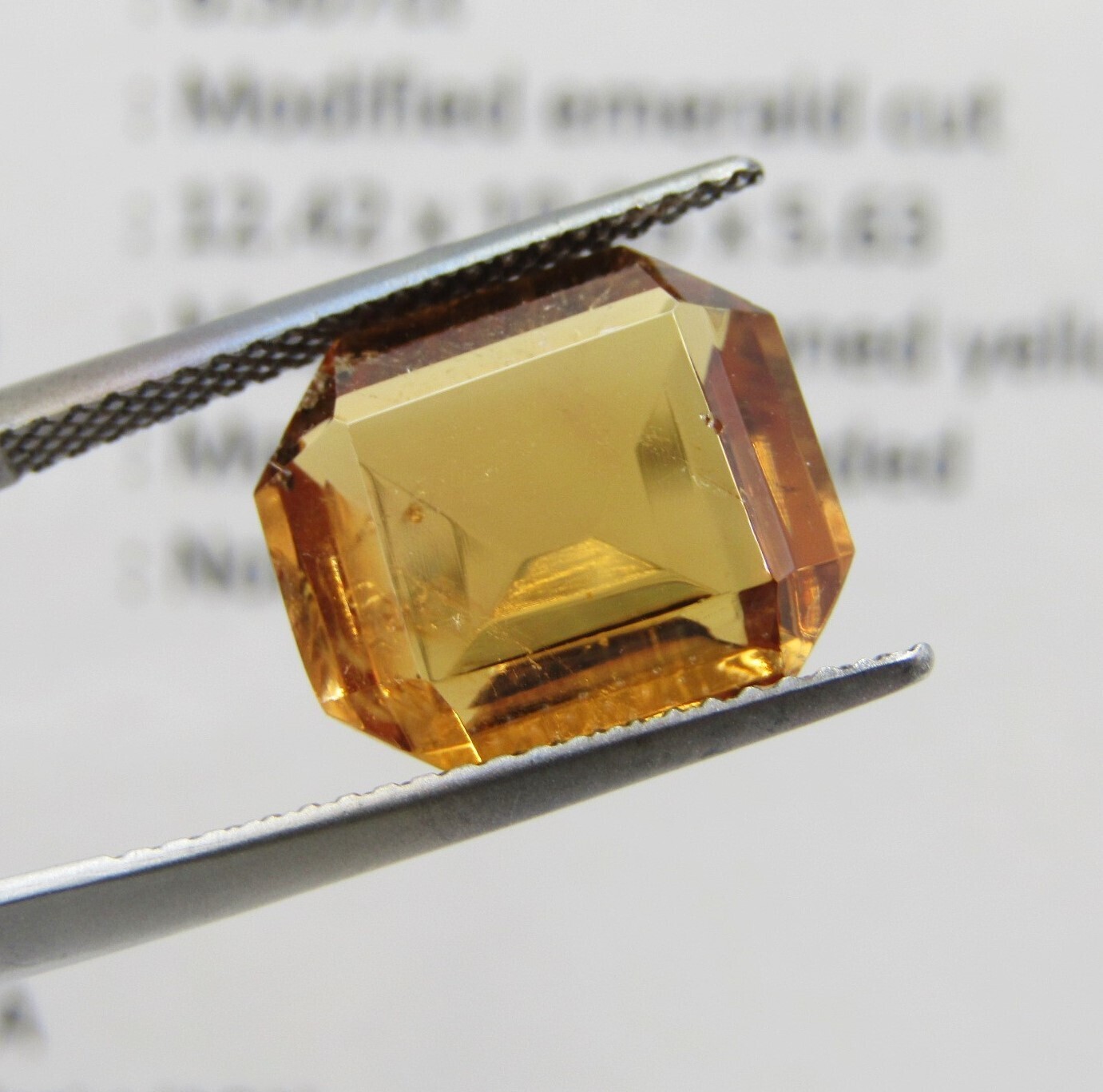 Tourmaline of 6,5 carat - modified Emerald cut - Medium dark toned yellow with Gemlab certificate