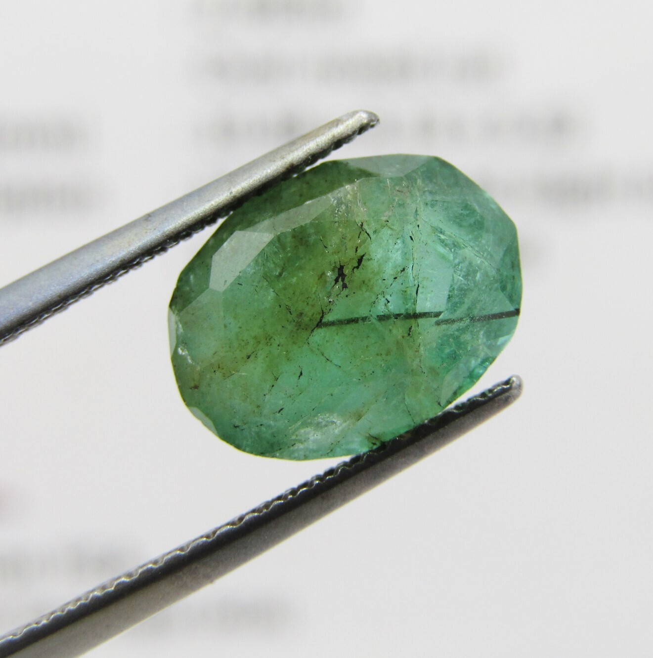 Natural Emerald of 2,99 carat oval mixed cut medium toned slight bluish green with Gemlab certificate