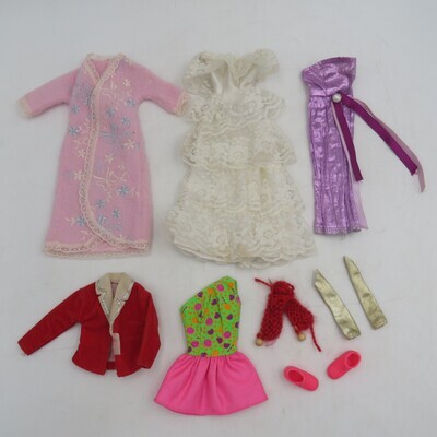 Lot of Barbie doll clothing and accessories