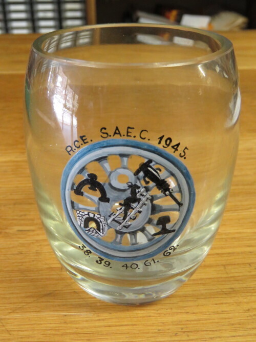 Glass cup issued to some members of the RCE SAEC who repaired LINE 87 in 1945