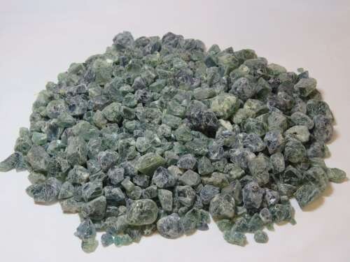 Lot of hundreds of small (1cm) to medium (2.5cm) pieces of rough Florite - Weighs 2.75 Kg