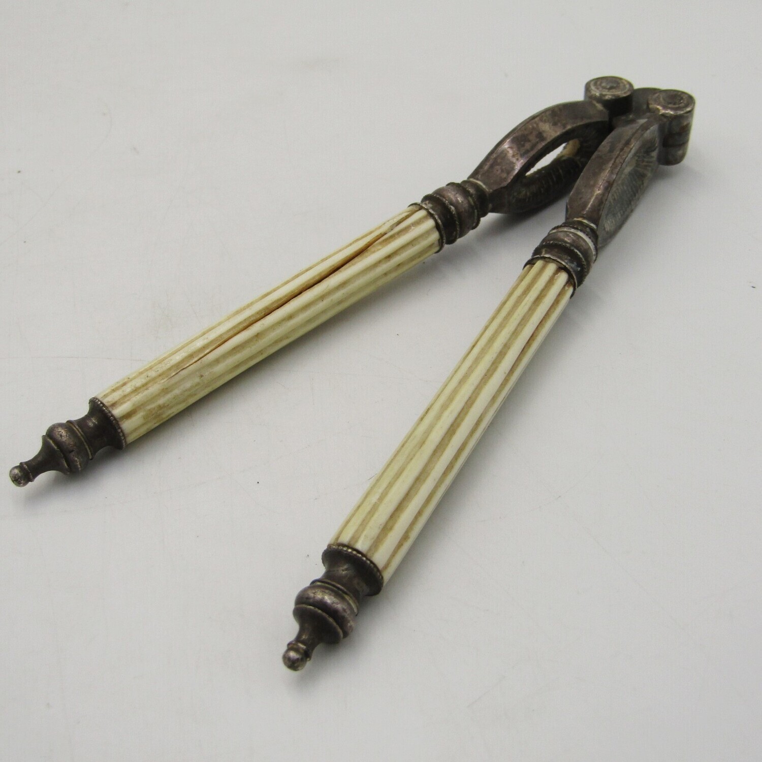 Antique nutcracker with imitation ivory handles