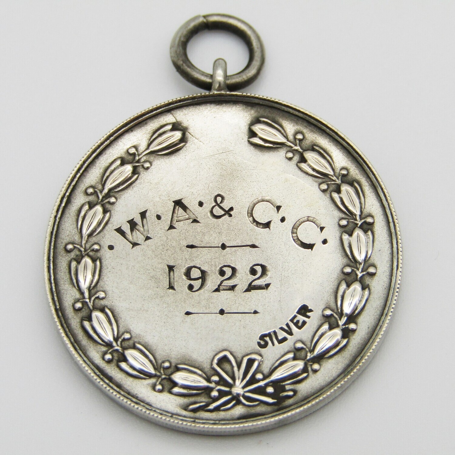 Antique W.A and C.C 1922 silver medallion