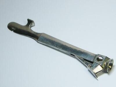 Vintage cigar cutter and pipe tool with silver sides