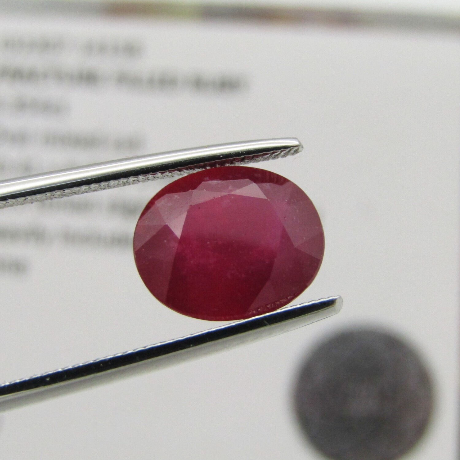 Dark toned slightly purplish red Natural Ruby - fracture filled 4,35 carat - with Gemlab certificate