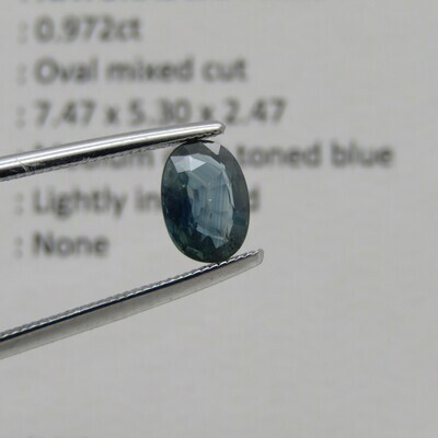 Natural Sapphire of 0,97 carat - oval mixed cut - medium dark toned blue with Gemlab certificate