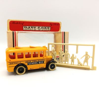 Lledo Dennis school bus die-cast model car in box with Figurines