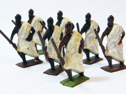 Lot of 7 vintage African lead toy soldiers with rifles