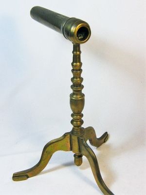 Antique curling tongs with brass cooling stand