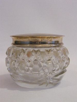 Large cut glass powder vessel with hallmarked silver lid
