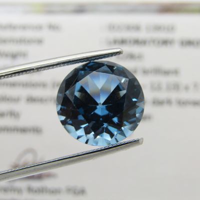 Lab grown Spinel of 7,528 carat - round brilliant cut - Medium dark toned blue - identical to a natural stone at a fraction of the price - with Gemlab certificate