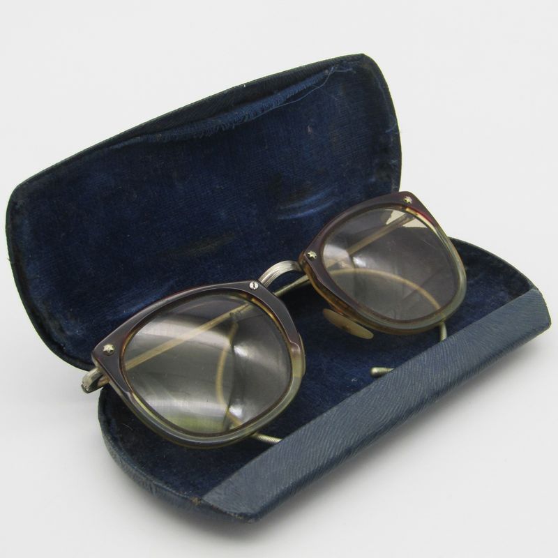 Pair of vintage glasses in case