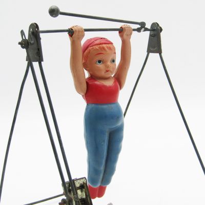 Vintage mechanical gymnast toy - main spring broken
