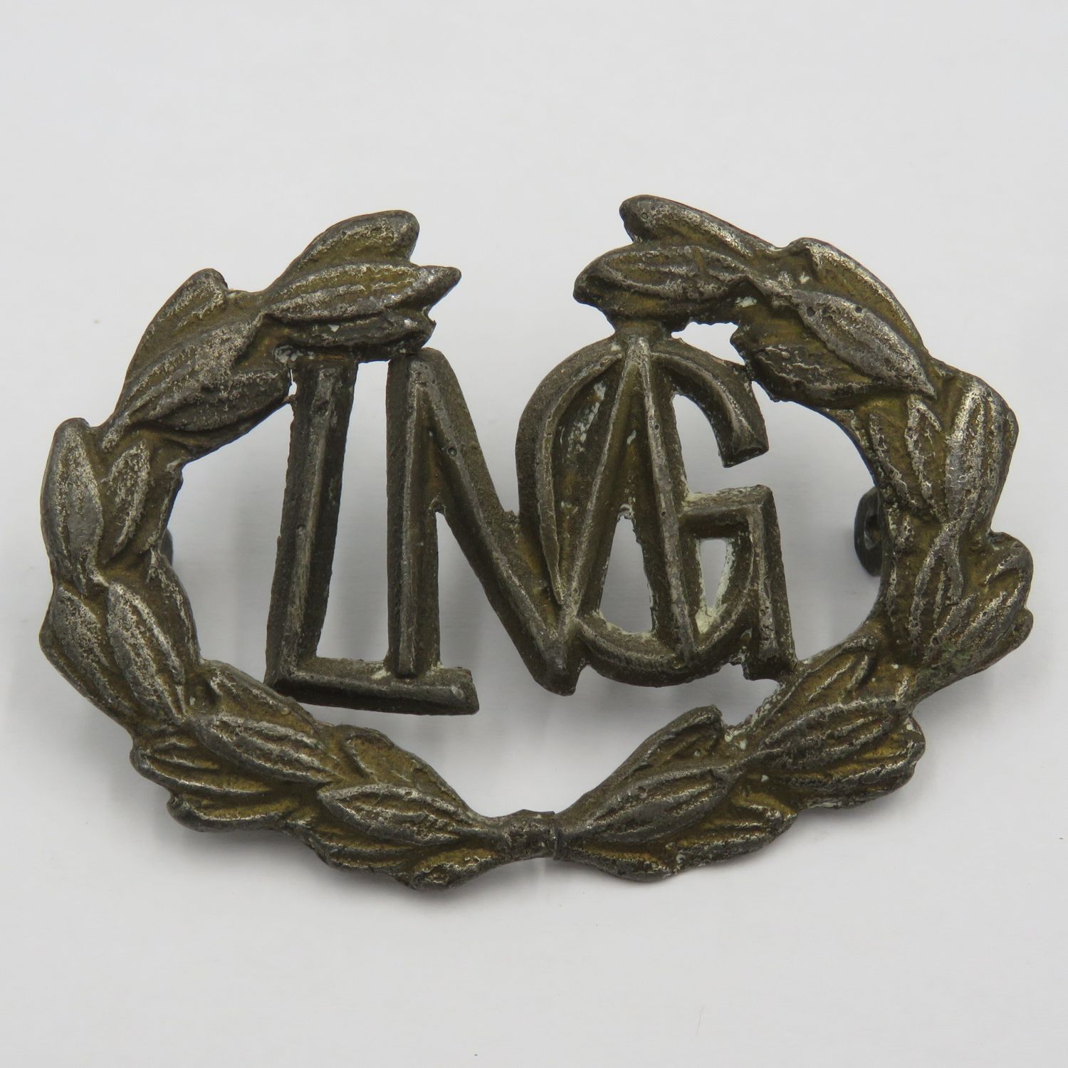 Light Machine gunner lead cast badge- wreath broken in centre