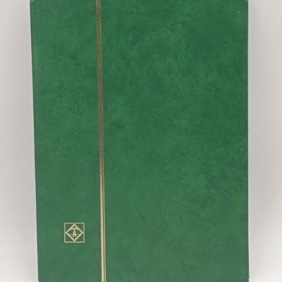 16 page stamp album with about 180 Rhodesia mint stamps